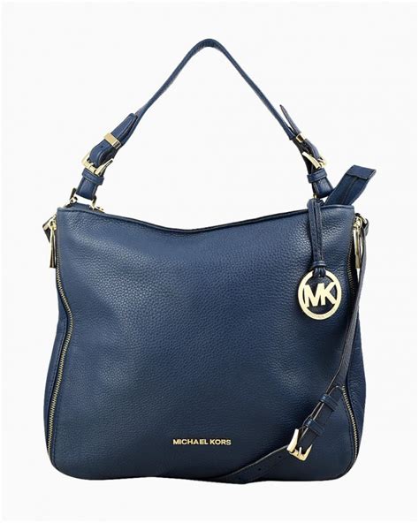 Bolsa michael kors azul marinho .